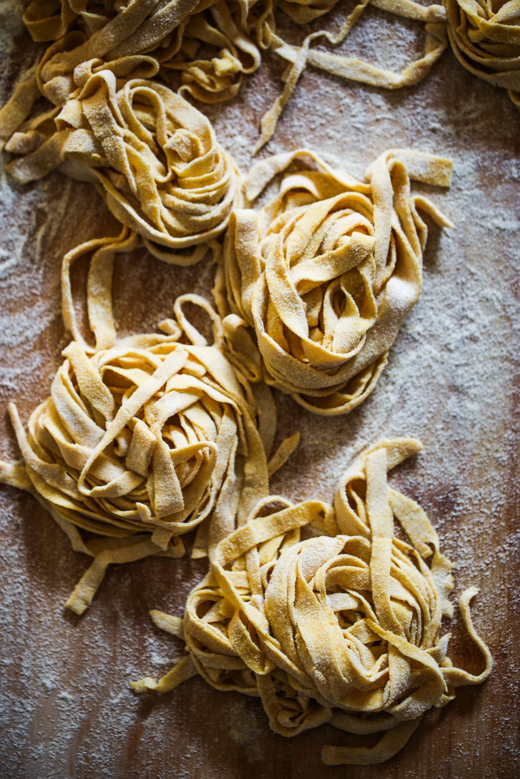 Homemade pasta on a brown table