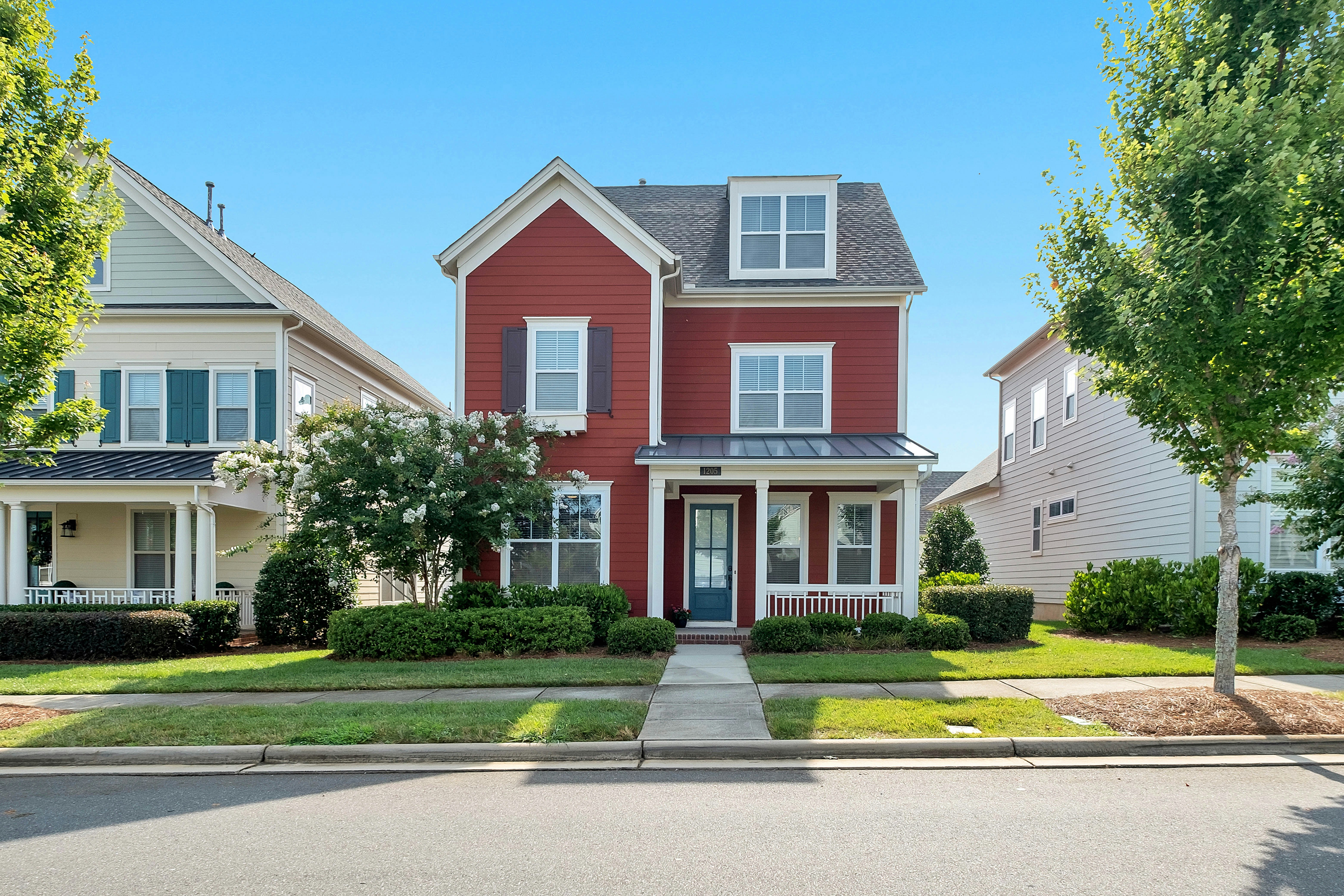 Red home exterior well kept